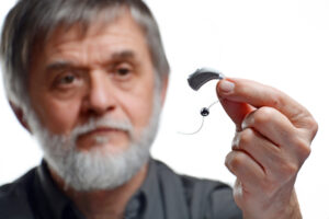 man in need of hearing aid repairs in Manassas VA