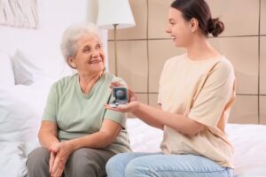 woman trying Receiver-in-the-Ear Hearing Aids