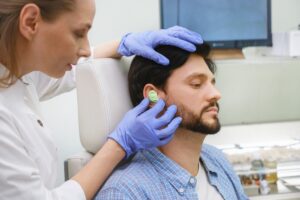 man getting custom earmolds in Fairfax County